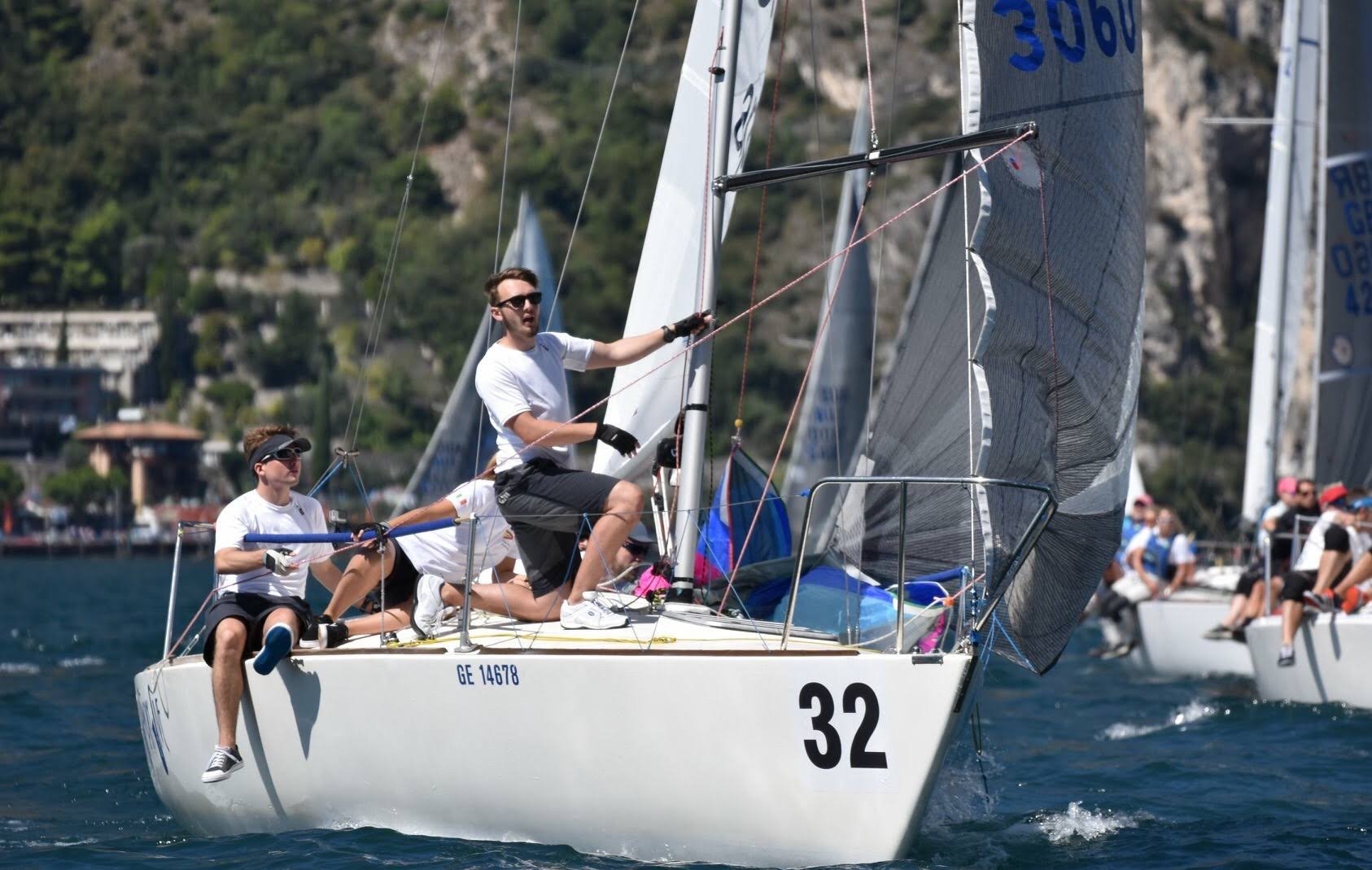 Sailing crew racing a boat